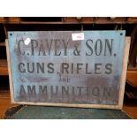 A VINTAGE PATINATED BRASS SIGN, 'C.PAVEY & SON, GUNS, RIFLES AND AMMUNITION'