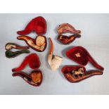 A COLLECTION OF FIGURAL TOBACCO PIPES