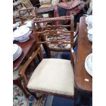 A SET OF TEN REPRODUCTION HARDWOOD DINING CHAIRS