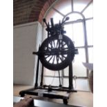 A 19TH CENTURY FRUIT WOOD SPINNING WHEEL