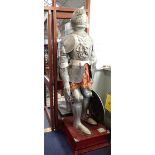 A REPRODUCTION FULL SIZE SUIT OF ARMOUR