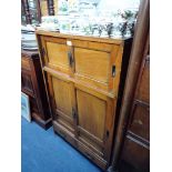 AN EARLY 20TH CENTURY CHINESE ELM CABINET