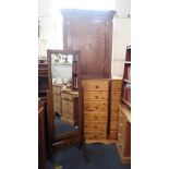 A GEORGE III OAK HANGING CORNER CUPBOARD