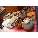 A COLLECTION OF STONEWARE STORAGE JARS