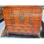 AN EARLY 20TH CENTURY CHINESE ELM CABINET