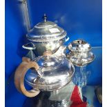 A THREE PIECE SILVER PLATED TEA SET