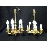 A PAIR OF ORMOLU FIVE BRANCH CHANDELIERS