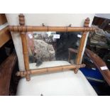 A 19TH CENTURY FRENCH FAUX BAMBOO WALL MIRROR