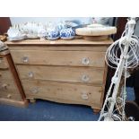 A VICTORIAN STRIPPED PINE CHEST OF DRAWERS