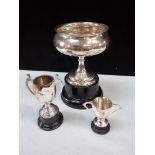 A SILVER TROPHY CUP