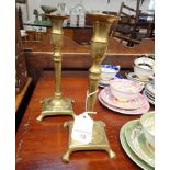 A PAIR OF EARLY 18TH CENTURY BRASS CANDLESTICKS