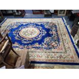 A LARGE BLUE GROUND CHINESE RUG