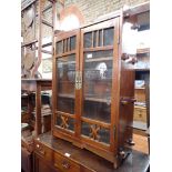 A CHINESE GLAZED STAINED PINE CABINET