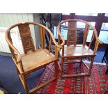 A PAIR OF 19TH CENTURY CHINESE ELM 'HORSESHOE' CHAIRS