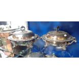 A PAIR OF 19TH CENTURY SILVER PLATED LIDDED SERVING DISHES