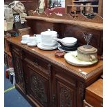 A VICTORIAN CARVED OAK SIDEBOARD