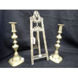 A PAIR OF VICTORIAN BRASS CANDLESTICKS