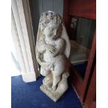 A RE-CONSTITUTED STONE GARDEN STATUE OF A CHILD