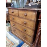 A VICTORIAN MAHOGANY CHEST OF DRAWER