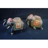 A PAIR OF CARVED INDIAN WOODEN ELEPHANTS