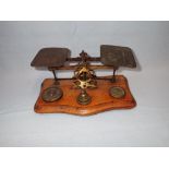 A SET OF BRASS POSTAL SCALES