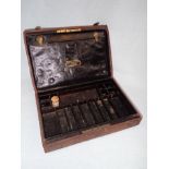 A 19TH CENTURY LEATHER ARTIST'S BOX