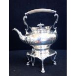 A SILVER TEA KETTLE ON STAND, WITH BURNER