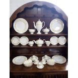 A WEDGWOOD 'MIMOSA' PART DINNER SERVICE