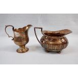 A WALKER & HALL SILVER MILK JUG, AND A (DAMAGED) GEORGE III SILVER CREAM JUG