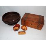 A CARVED WOODEN FRUIT BOWL