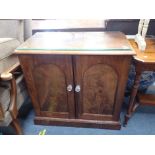 A VICTORIAN FIGURED MAHOGANY CABINET