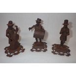 THREE 19TH CENTURY CAST IRON STUDIES OF MUSICIANS