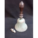 A HAND BELL WITH TURNED WOODEN HANDLE 27 cm high