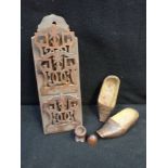 A PAIR OF 19TH CENTURY MINIATURE CARVED WOODEN CLOGS