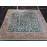 A LARGE PERSIAN DESIGN CARPET