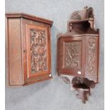 A VICTORIAN CARVED OAK HANGING CORNER CABINET