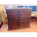 A STAINED PINE COLLECTORS' OR SPECIMEN CHEST OF SEVEN DRAWERS