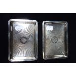 A PAIR OF SILVER VISITING CARD TRAYS