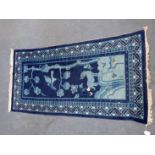 A BLUE GROUND CHINESE RUG