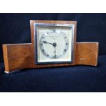 A 1950S 'ELLIOTT' CLOCK RETAILED BY GARRARD & CO,
