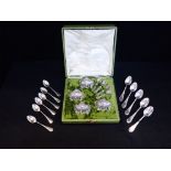 A CASED SET OF FRENCH SILVER-PLATED SALTS AND SPOONS