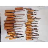 A LARGE COLLECTION OF WOODWORKING CHISELS