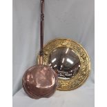 A REPOUSSE BRASS FRAMED CONVEX MIRROR