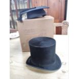 A TOP HAT AND A 'MORTAR BOARD'