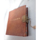 A 19TH CENTURY LEATHERBOUND LOCKABLE (KEY PRESENT) ACCOUNTS LEDGER