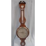 A GEORGE III MAHOGANY WHEEL BAROMETER