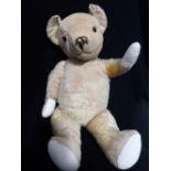 A VINTAGE PLUSH TEDDY BEAR