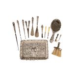 A MATCHED SILVER DRESSING SET