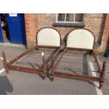 A PAIR OF FRENCH SINGLE BEDS