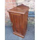 AN EDWARDIAN WALNUT POT CUPBOARD